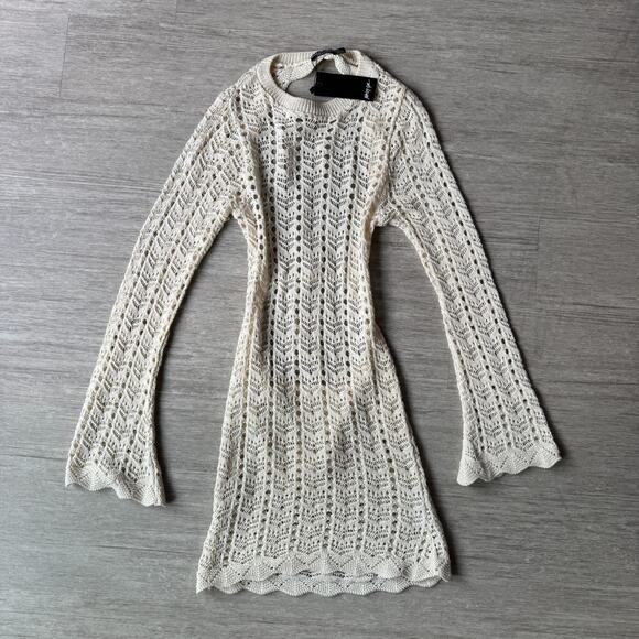 Nasty Gal Dresses & Skirts - Nasty Gal Crochet Knit Mini Dress NWT US 12 Open Back Cream Long Sleeve Flared